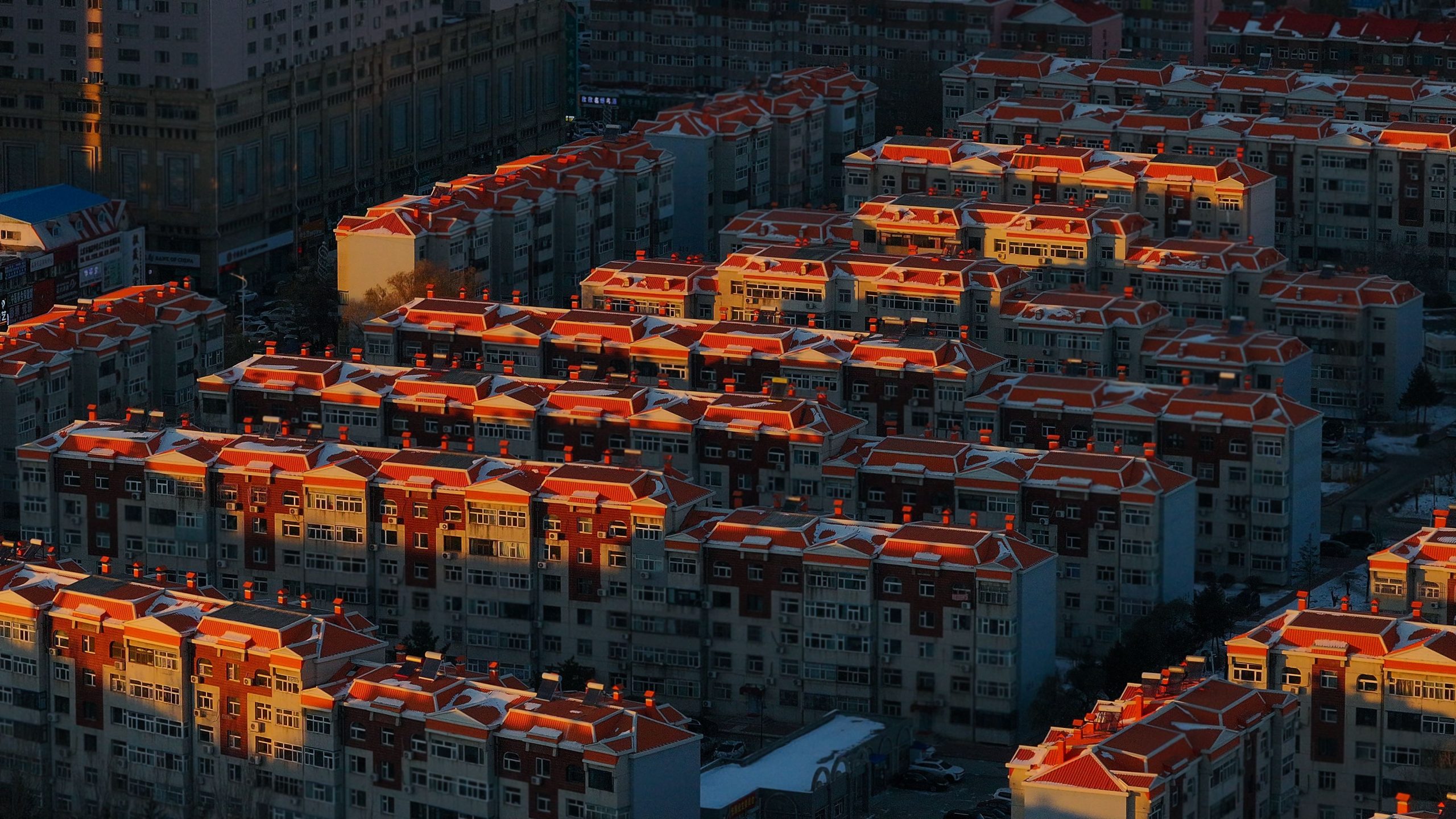 Vue aérienne immeubles résidentiels Da Qing Shi coucher soleil